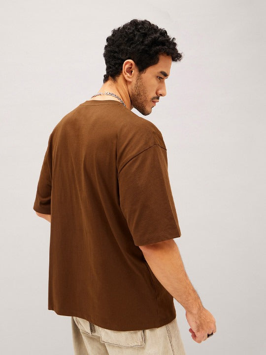 Unisex Brown Typography Printed Pure Cotton Oversized T-shirt – Premium Streetwear Style for Men & Women in Pakistan | PRINDA