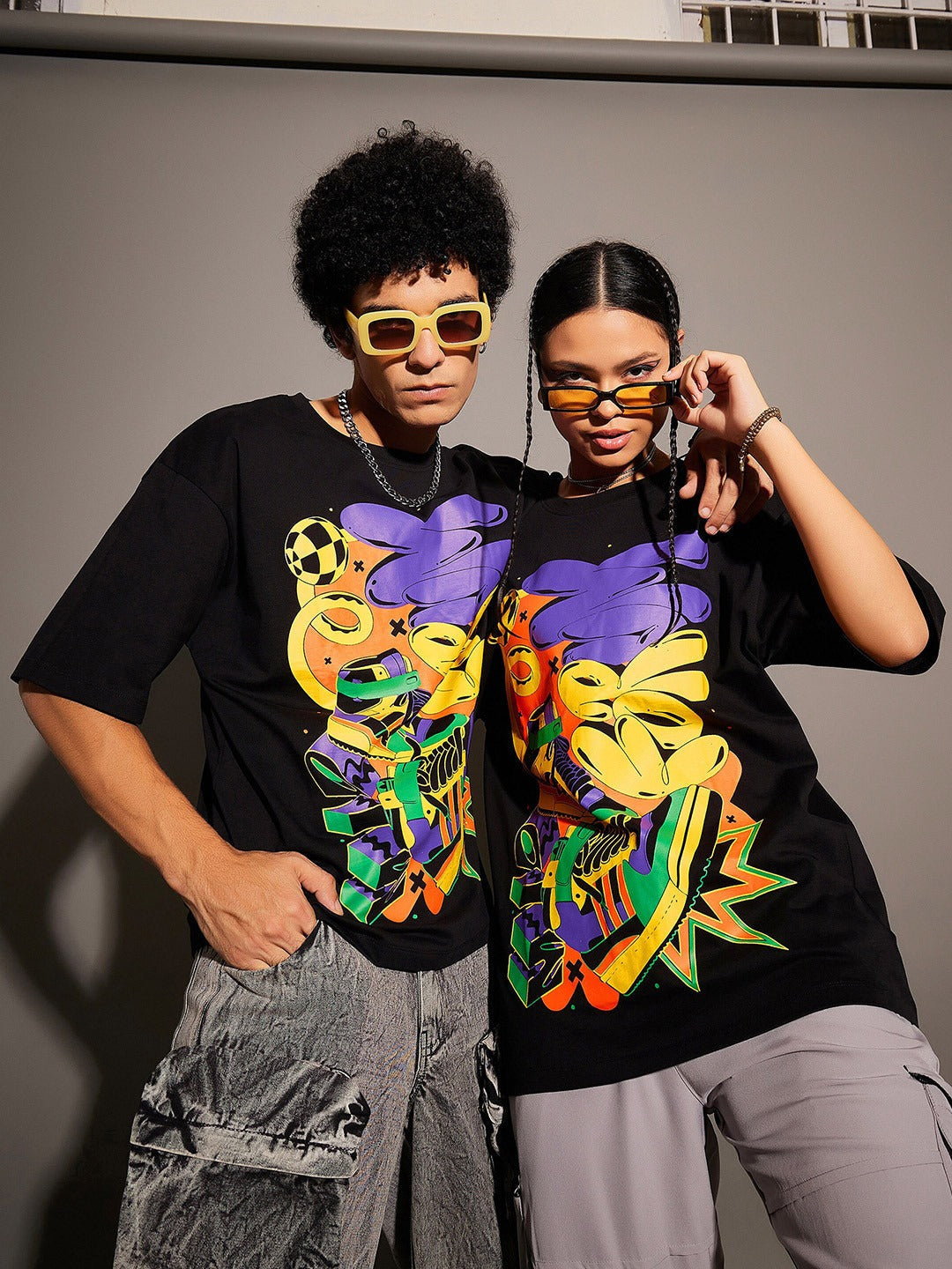 Unisex Black Graphic Printed Pure Cotton Oversized T-shirt – Trendy Streetwear for Men & Women in Pakistan | PRINDA